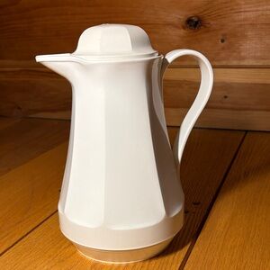 Thermos White and Silver Container